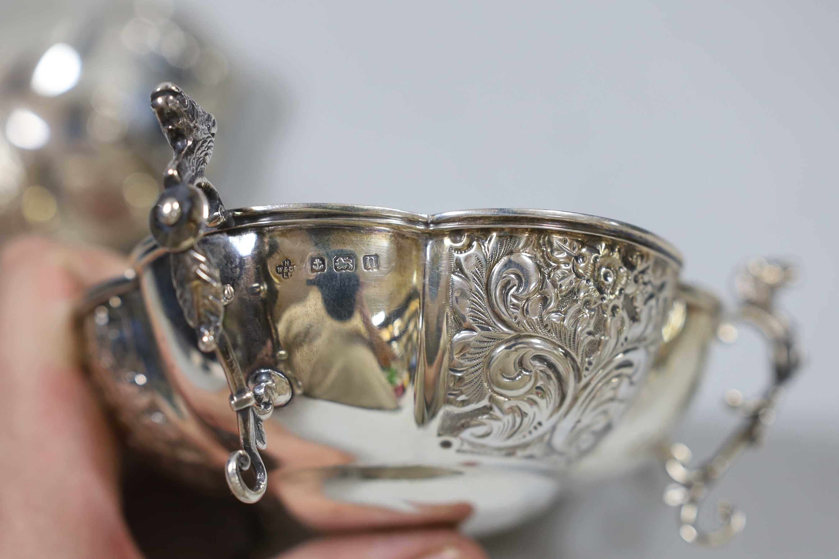 A pair of George V silver tri-handled bonbon dishes, Horace Woodward & Co Ltd, Birmingham, 1912, diameter 12.5cm, 8.4oz.